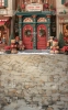 tlo-fotograficzne-santas-shop-swiateczny-sklep-zabawkowy-czerwone-drzwi-wience-misie-snieg-Z744.webp
